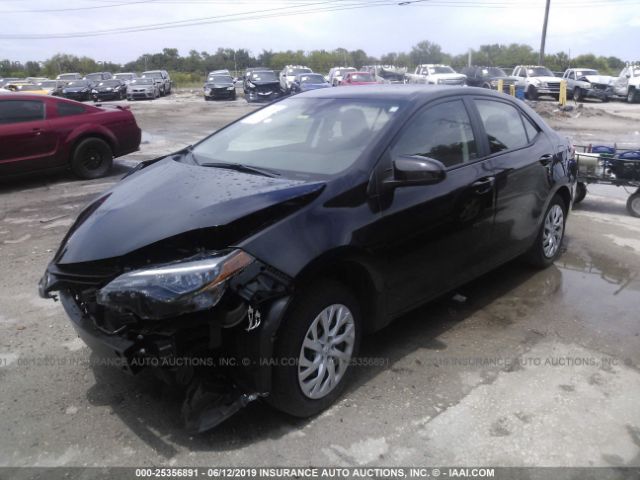 Photo 1 VIN: 5YFBURHE5KP891560 - TOYOTA COROLLA 