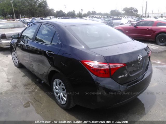 Photo 2 VIN: 5YFBURHE5KP891560 - TOYOTA COROLLA 