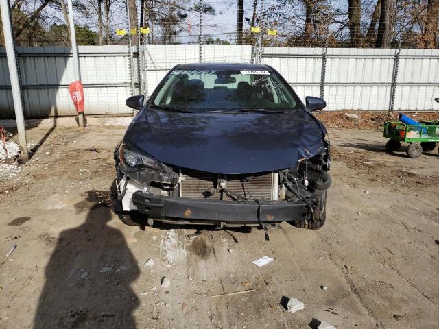 Photo 4 VIN: 5YFBURHE5KP899013 - TOYOTA COROLLA L 