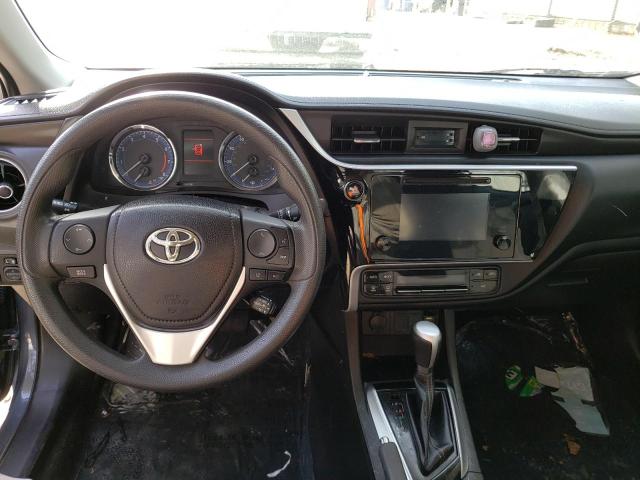 Photo 7 VIN: 5YFBURHE5KP899013 - TOYOTA COROLLA L 