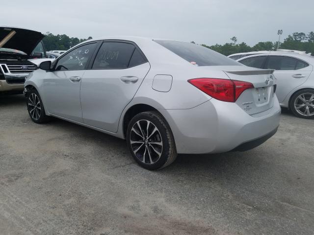 Photo 2 VIN: 5YFBURHE5KP900581 - TOYOTA COROLLA L 