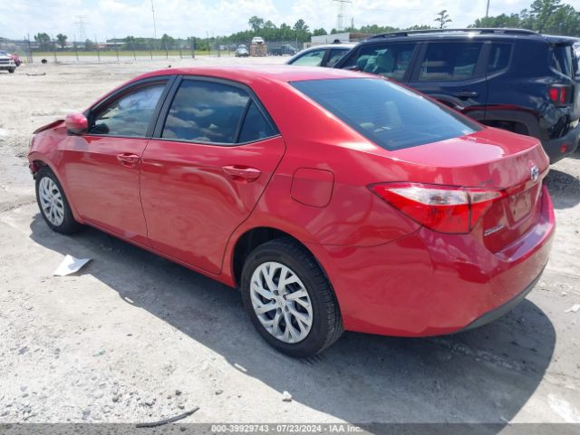 Photo 2 VIN: 5YFBURHE5KP900967 - TOYOTA COROLLA 