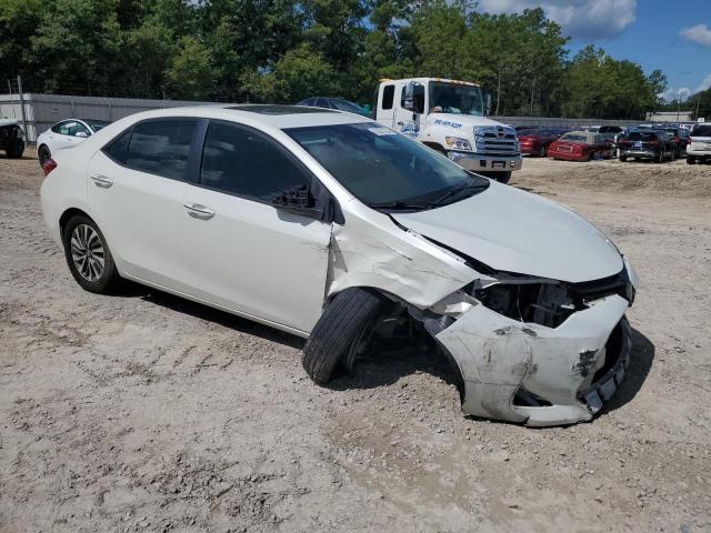 Photo 3 VIN: 5YFBURHE5KP901228 - TOYOTA COROLLA L 