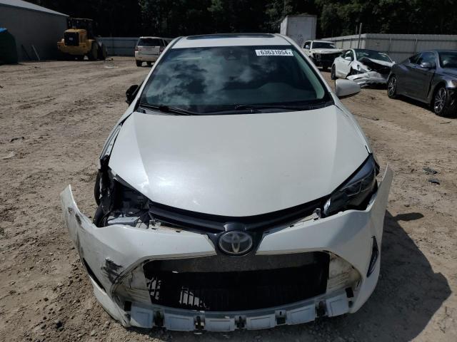 Photo 4 VIN: 5YFBURHE5KP901228 - TOYOTA COROLLA L 