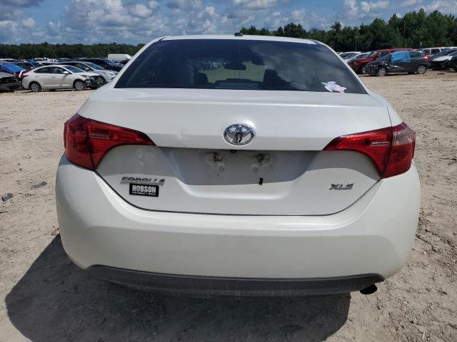 Photo 5 VIN: 5YFBURHE5KP901228 - TOYOTA COROLLA L 