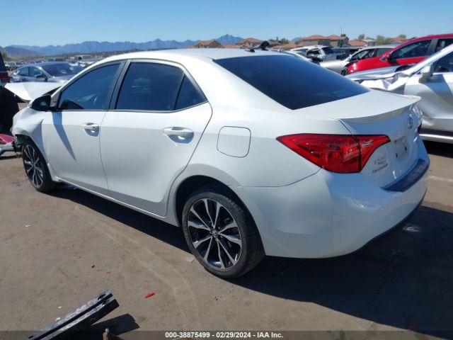 Photo 2 VIN: 5YFBURHE5KP902993 - TOYOTA COROLLA 