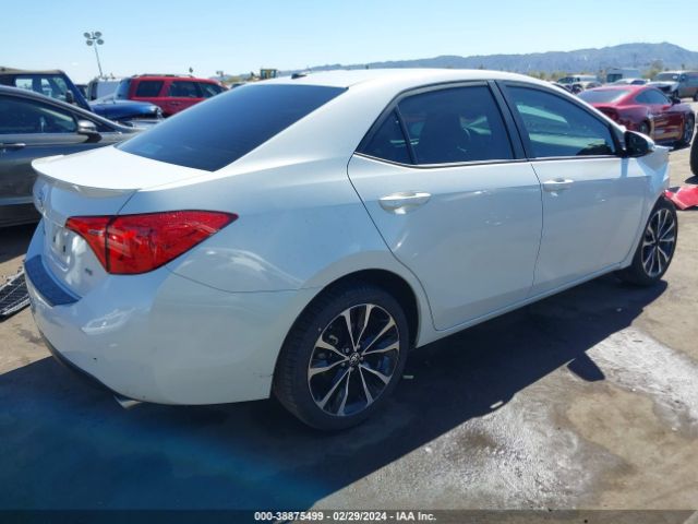 Photo 3 VIN: 5YFBURHE5KP902993 - TOYOTA COROLLA 