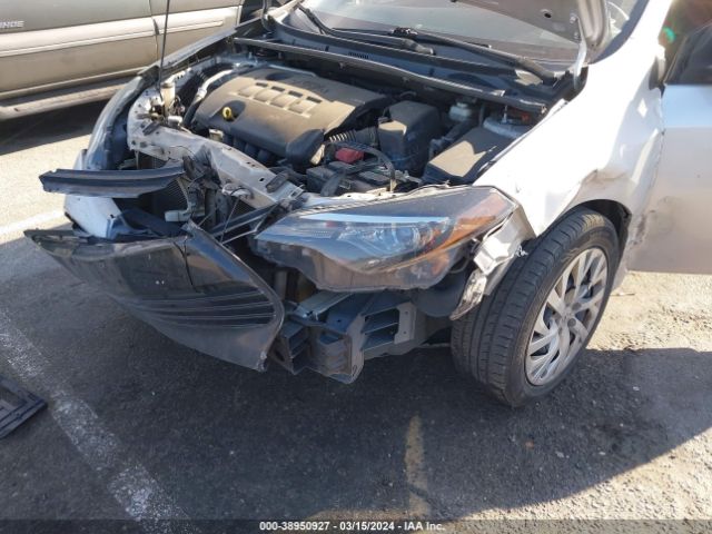 Photo 5 VIN: 5YFBURHE5KP905473 - TOYOTA COROLLA 