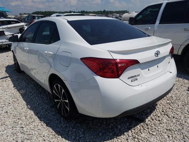 Photo 2 VIN: 5YFBURHE5KP907191 - TOYOTA COROLLA L 