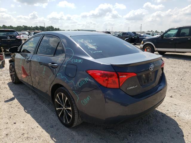 Photo 2 VIN: 5YFBURHE5KP910575 - TOYOTA COROLLA L 