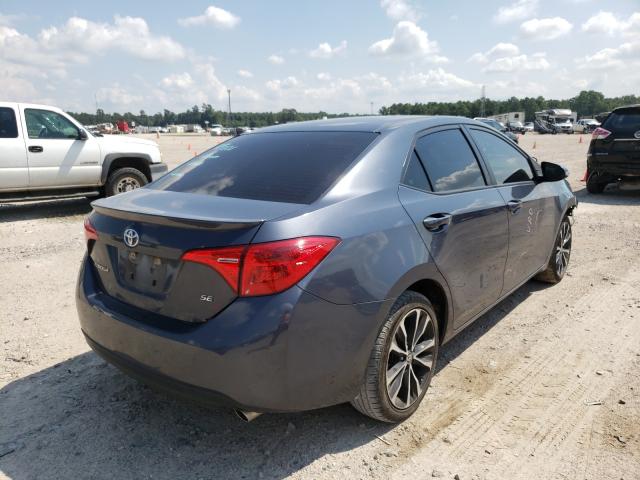 Photo 3 VIN: 5YFBURHE5KP910575 - TOYOTA COROLLA L 