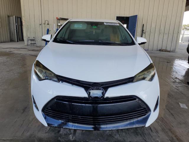 Photo 4 VIN: 5YFBURHE5KP912634 - TOYOTA COROLLA L 