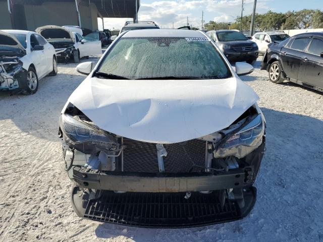 Photo 4 VIN: 5YFBURHE5KP913508 - TOYOTA COROLLA L 