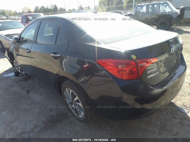 Photo 2 VIN: 5YFBURHE5KP938490 - TOYOTA COROLLA 