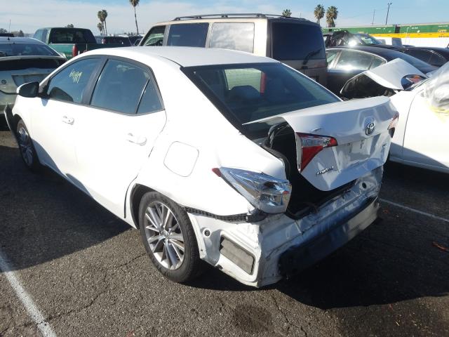 Photo 2 VIN: 5YFBURHE6EP059889 - TOYOTA COROLLA L 