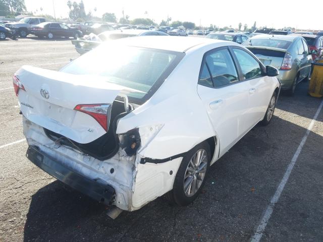 Photo 3 VIN: 5YFBURHE6EP059889 - TOYOTA COROLLA L 