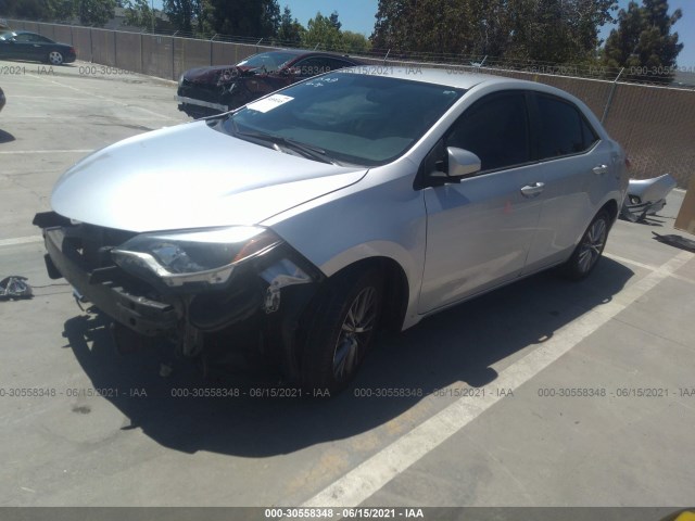 Photo 1 VIN: 5YFBURHE6EP099762 - TOYOTA COROLLA 