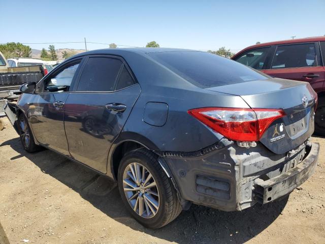 Photo 1 VIN: 5YFBURHE6EP103633 - TOYOTA COROLLA L 