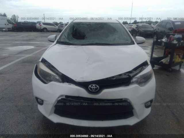 Photo 5 VIN: 5YFBURHE6EP118097 - TOYOTA COROLLA 