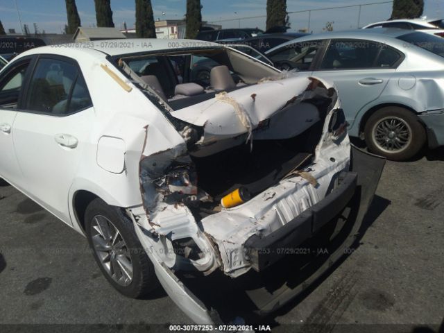 Photo 5 VIN: 5YFBURHE6FP184084 - TOYOTA COROLLA 