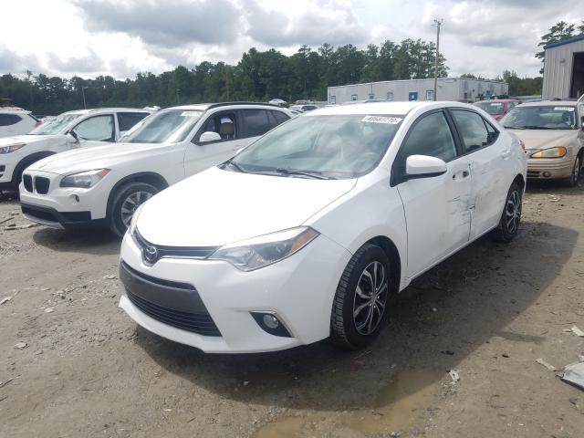 Photo 1 VIN: 5YFBURHE6FP210666 - TOYOTA COROLLA L 