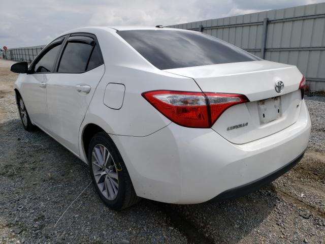 Photo 2 VIN: 5YFBURHE6FP308886 - TOYOTA COROLLA L 