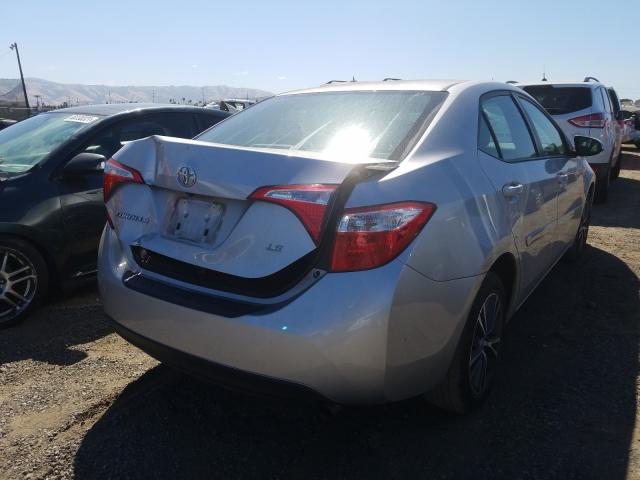 Photo 3 VIN: 5YFBURHE6GP372685 - TOYOTA COROLLA L 