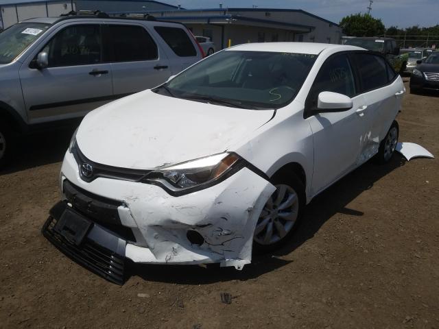 Photo 1 VIN: 5YFBURHE6GP414577 - TOYOTA COROLLA L 