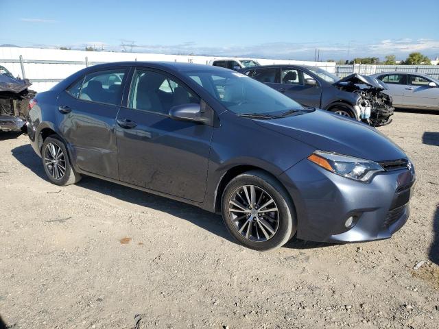 Photo 3 VIN: 5YFBURHE6GP470986 - TOYOTA COROLLA L 