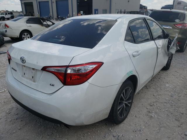 Photo 3 VIN: 5YFBURHE6GP514405 - TOYOTA COROLLA L 