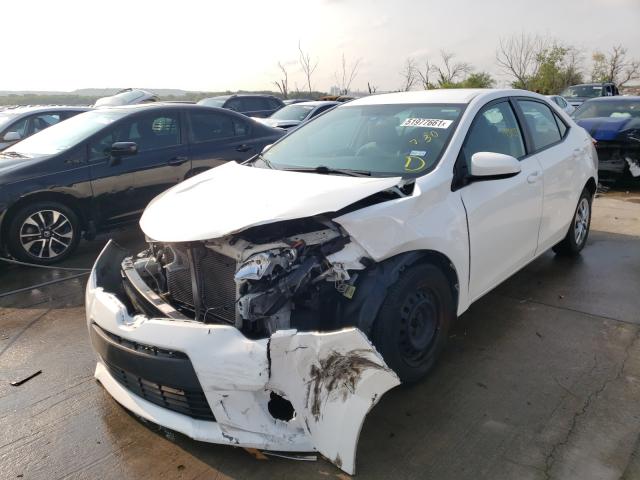 Photo 1 VIN: 5YFBURHE6GP523587 - TOYOTA COROLLA L 