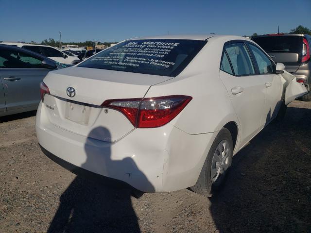 Photo 3 VIN: 5YFBURHE6GP537666 - TOYOTA COROLLA L 