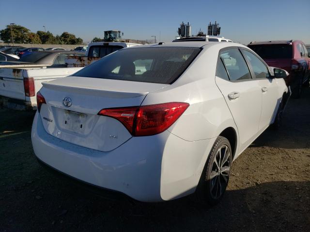 Photo 3 VIN: 5YFBURHE6HP600640 - TOYOTA COROLLA L 