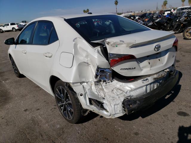 Photo 2 VIN: 5YFBURHE6HP604218 - TOYOTA COROLLA L 