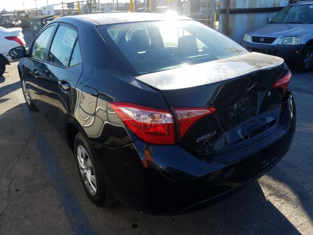 Photo 2 VIN: 5YFBURHE6HP615672 - TOYOTA COROLLA L 