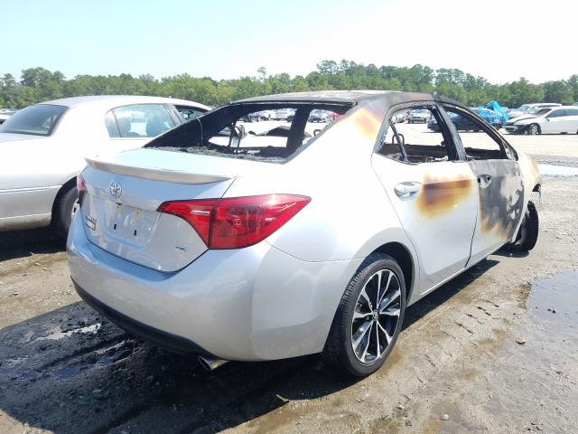 Photo 3 VIN: 5YFBURHE6HP648526 - TOYOTA COROLLA L 