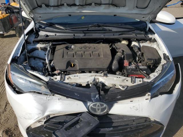 Photo 10 VIN: 5YFBURHE6HP679789 - TOYOTA COROLLA L 