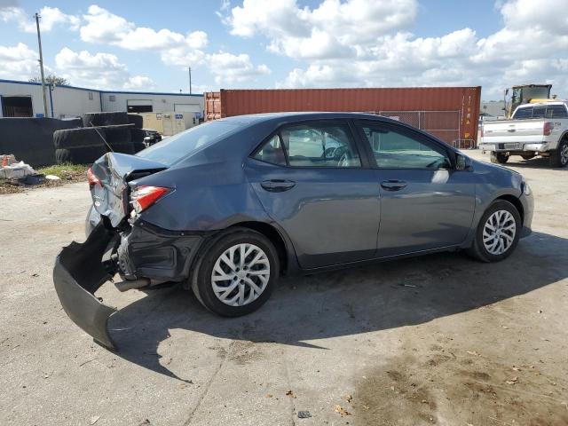 Photo 2 VIN: 5YFBURHE6HP702259 - TOYOTA COROLLA L 