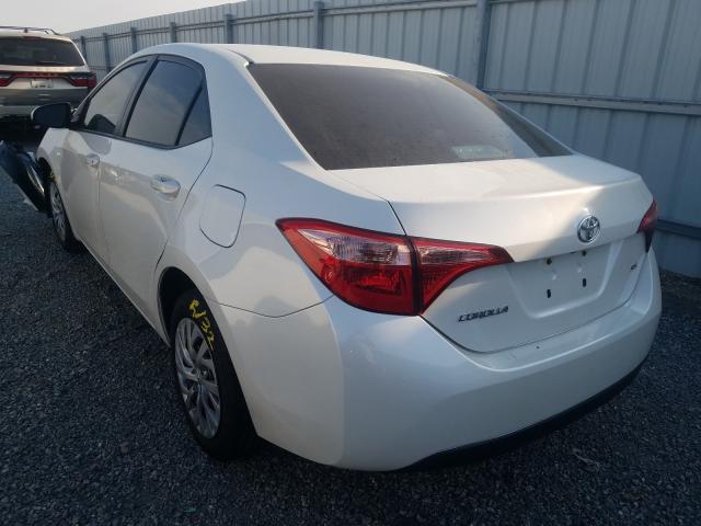 Photo 2 VIN: 5YFBURHE6JP741102 - TOYOTA COROLLA L 