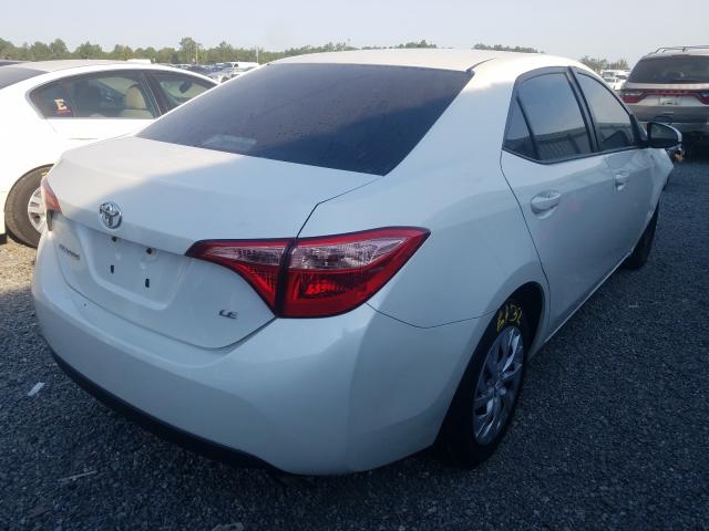 Photo 3 VIN: 5YFBURHE6JP741102 - TOYOTA COROLLA L 