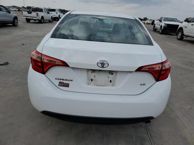 Photo 5 VIN: 5YFBURHE6JP760314 - TOYOTA COROLLA L 