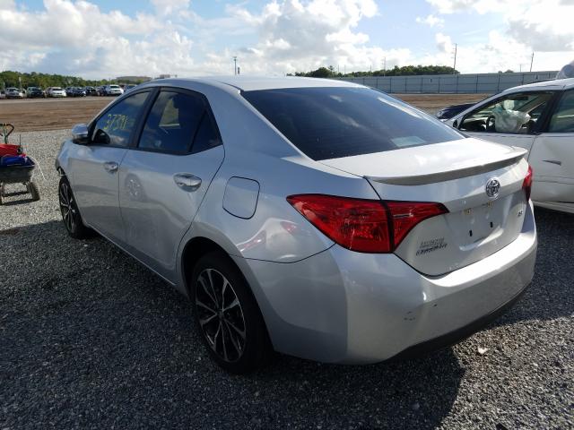 Photo 2 VIN: 5YFBURHE6JP763942 - TOYOTA COROLLA L 