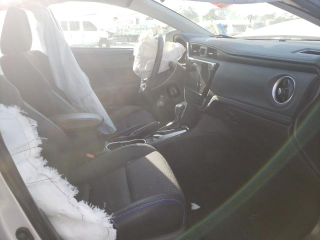 Photo 4 VIN: 5YFBURHE6JP775895 - TOYOTA COROLLA L 