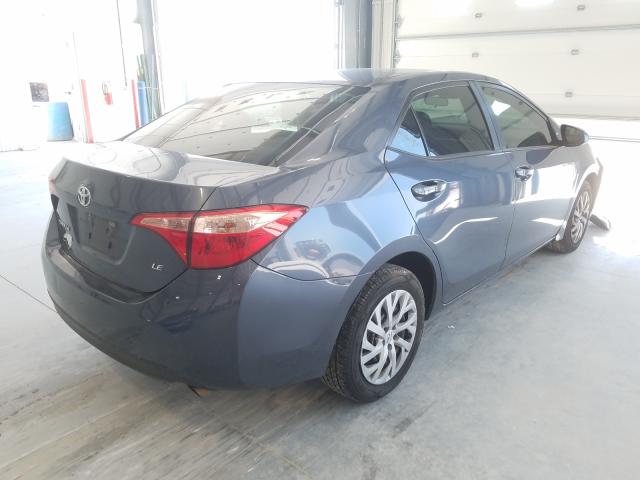 Photo 3 VIN: 5YFBURHE6JP781888 - TOYOTA COROLLA L 