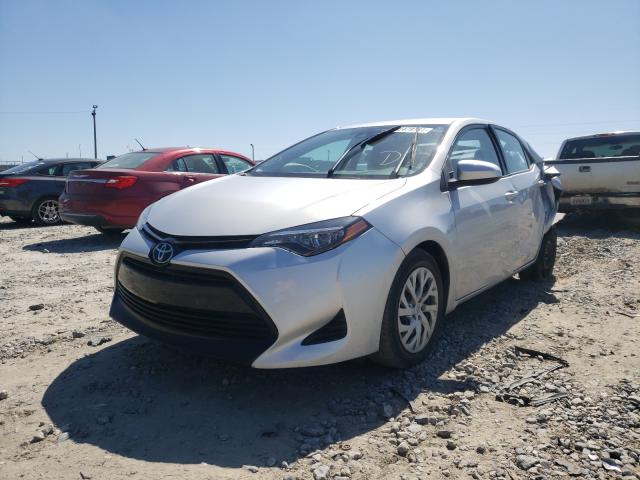 Photo 1 VIN: 5YFBURHE6JP801525 - TOYOTA COROLLA L 