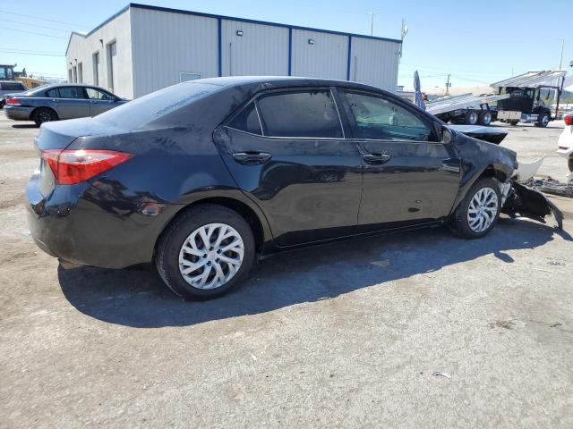 Photo 2 VIN: 5YFBURHE6JP807163 - TOYOTA COROLLA L 