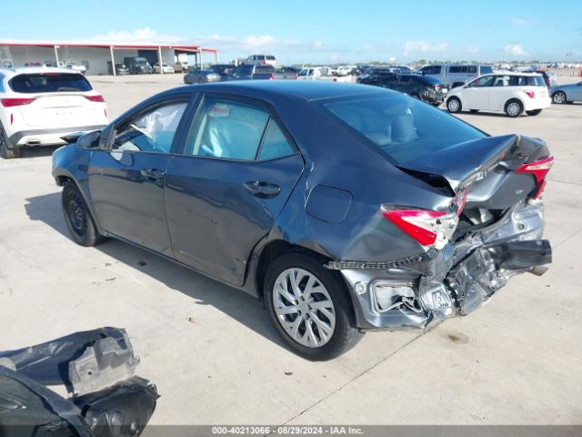 Photo 2 VIN: 5YFBURHE6JP809575 - TOYOTA COROLLA 