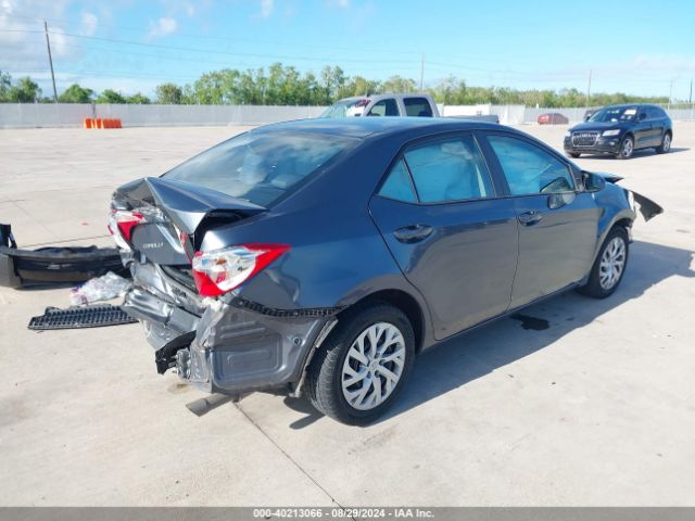 Photo 3 VIN: 5YFBURHE6JP809575 - TOYOTA COROLLA 