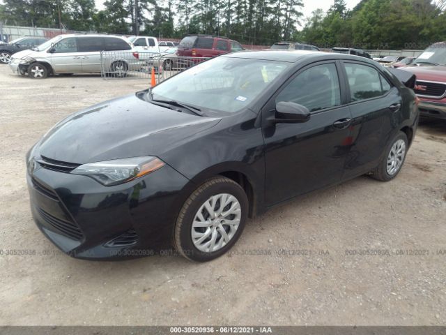 Photo 1 VIN: 5YFBURHE6JP810113 - TOYOTA COROLLA 