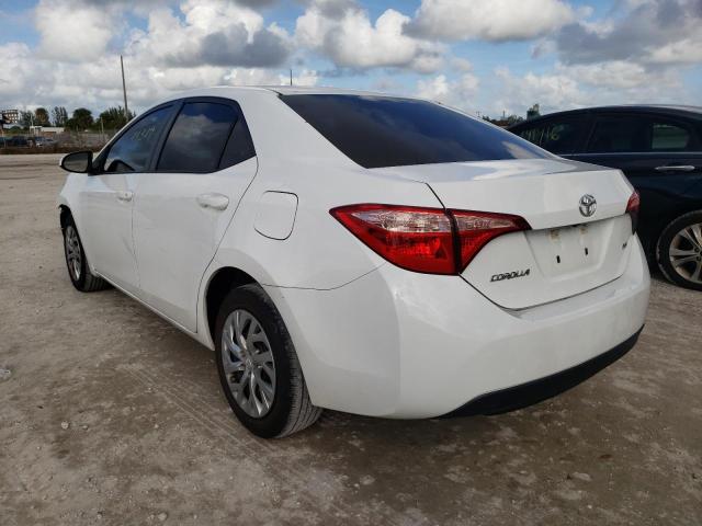 Photo 2 VIN: 5YFBURHE6JP821015 - TOYOTA COROLLA L 